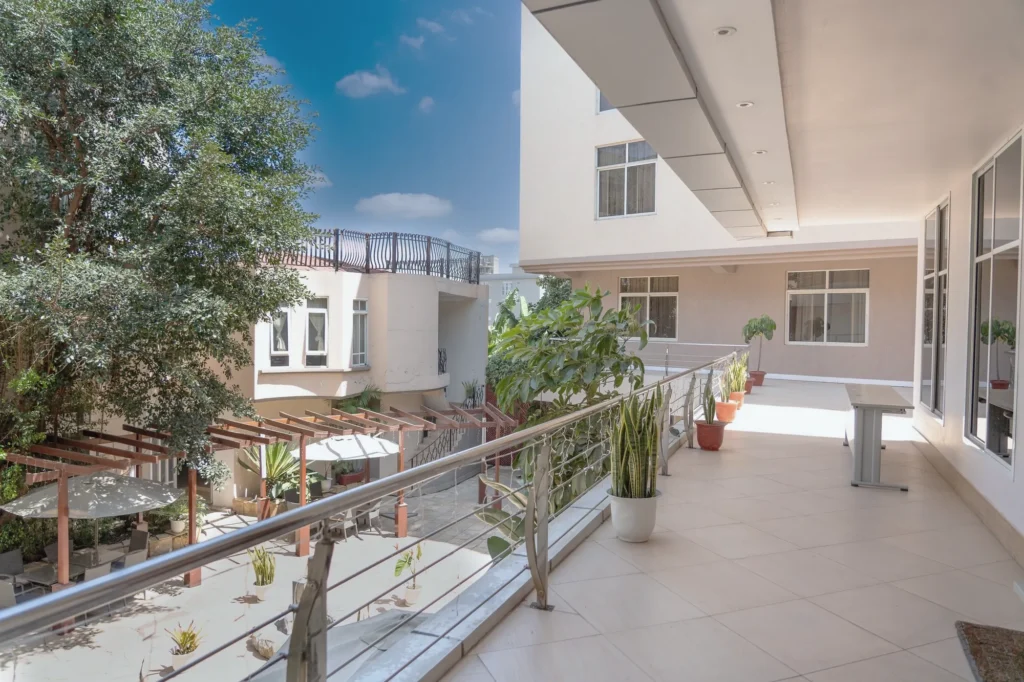 Balcony walkway overlooking the garden courtyard