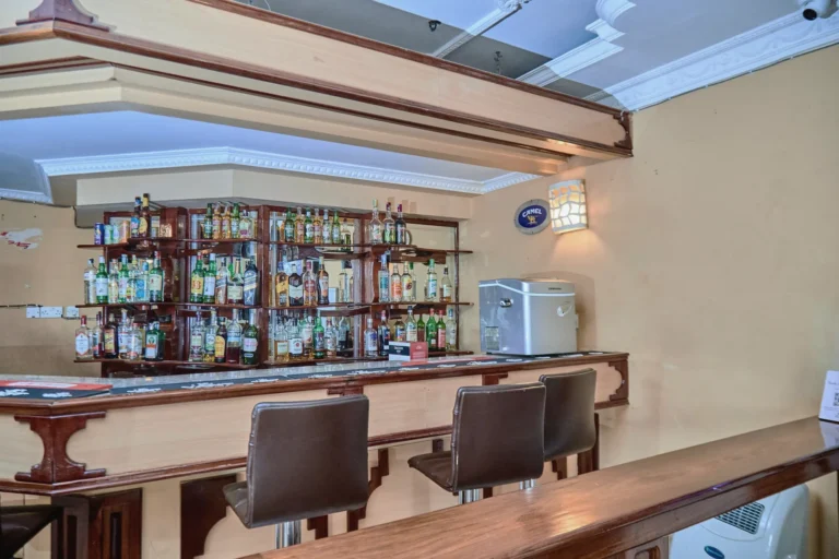 Bar stools along a polished timber counter